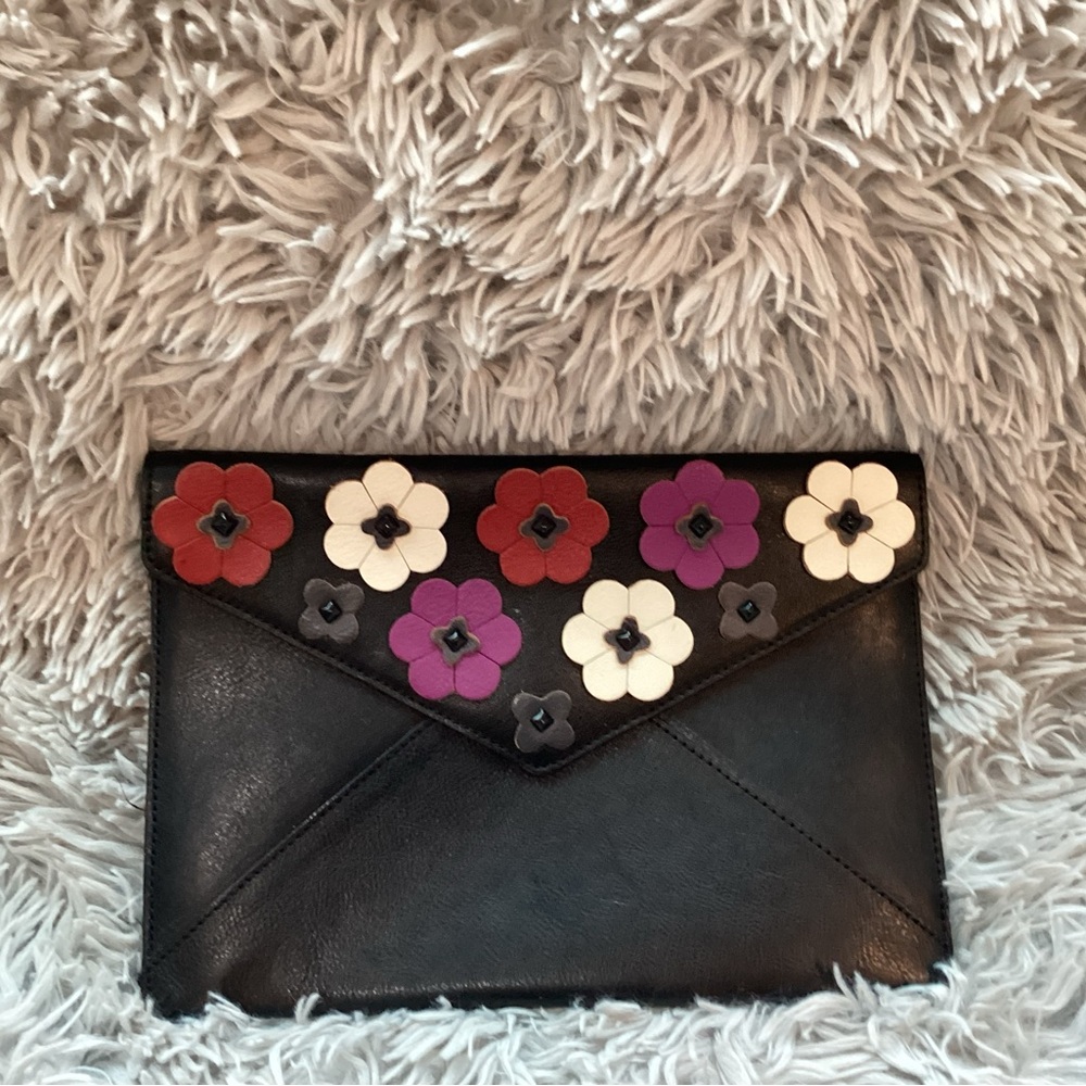 Rebecca Minkoff Clutch Bag with flower petals. 10x7